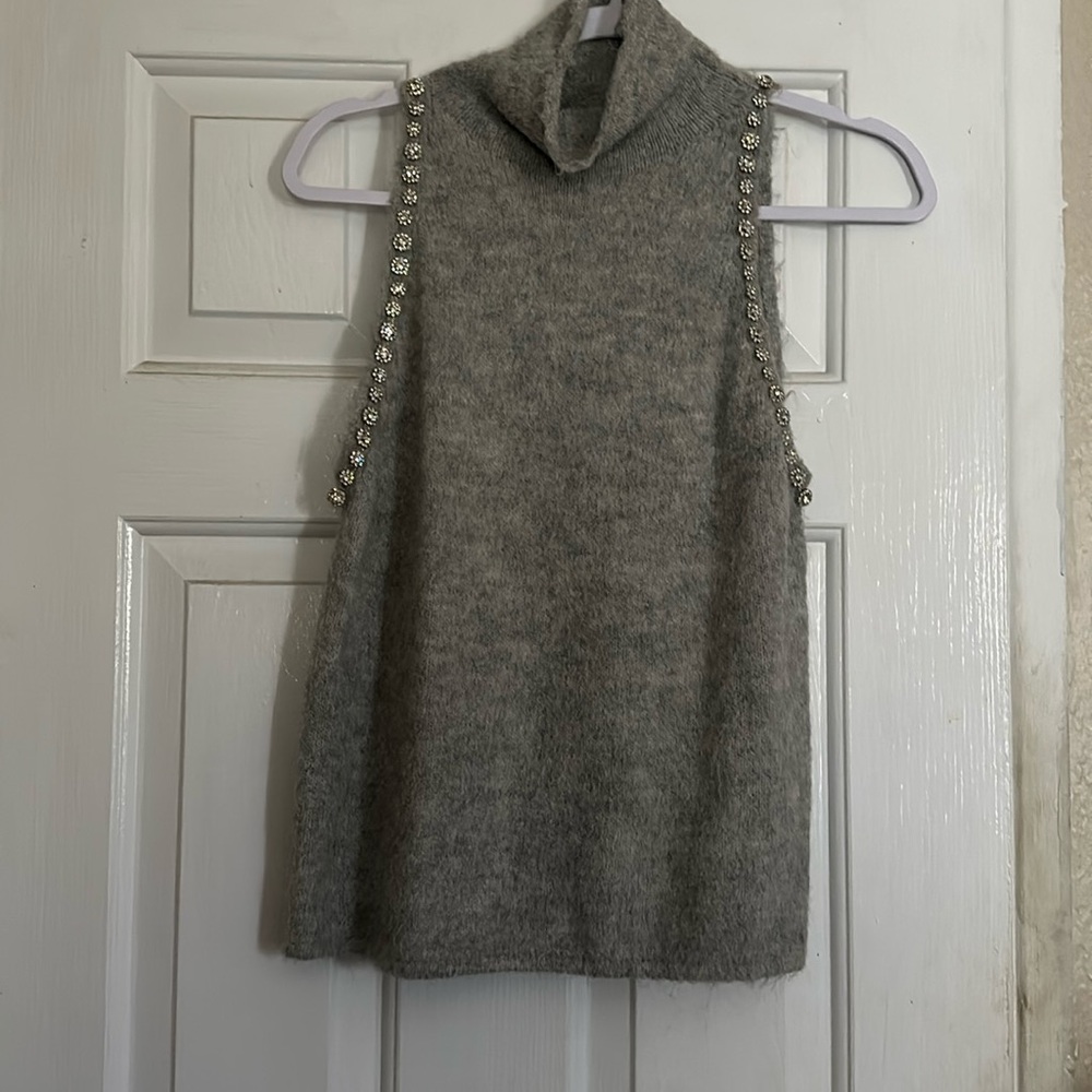 Gray sleeveless jeweled blouse